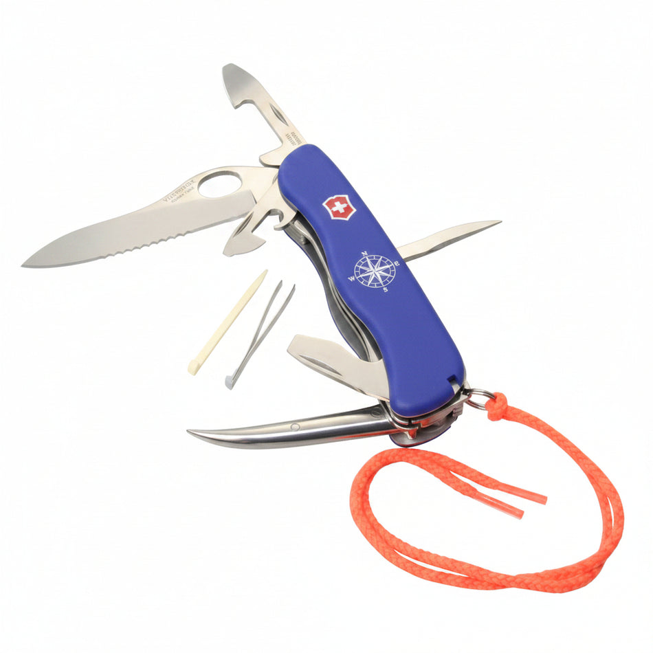 Victorinox Skipper Pro VI08 geöffnet – große Feststell-Wellenschliff-Klinge, Feststell-Marlspieker, Pinzette und Zahnstocher sichtbar, blauer Griff mit Kompassrose und oranger Kordel
